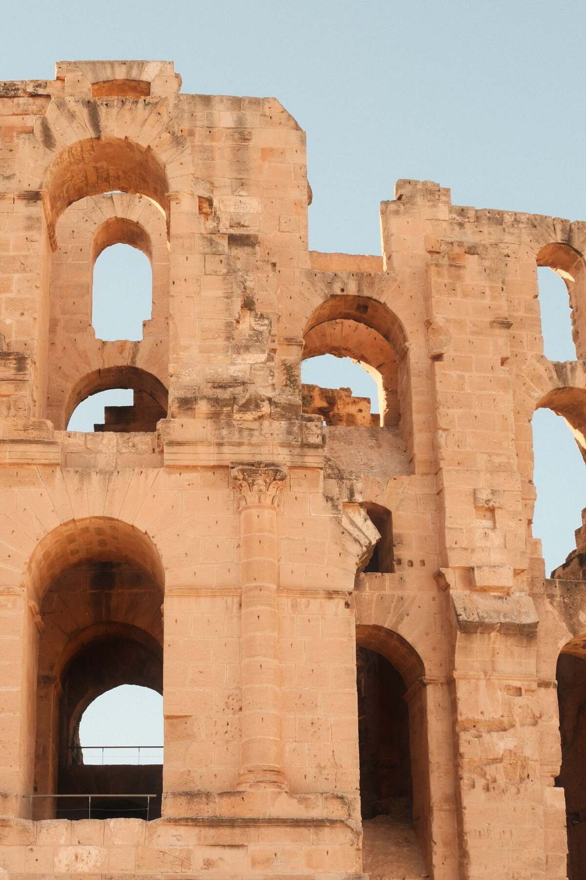 Weathered arches of the Roman amphitheatre at El Jem, Tunisia