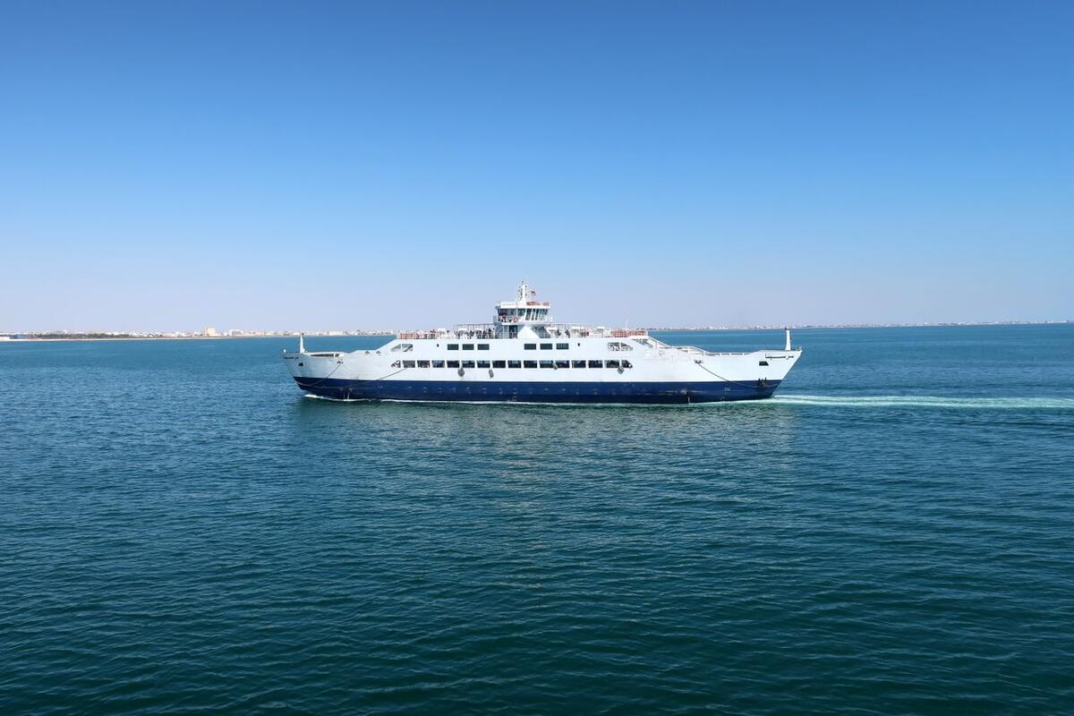 Ferry crossing calm blue water off Sfax, Tunisia