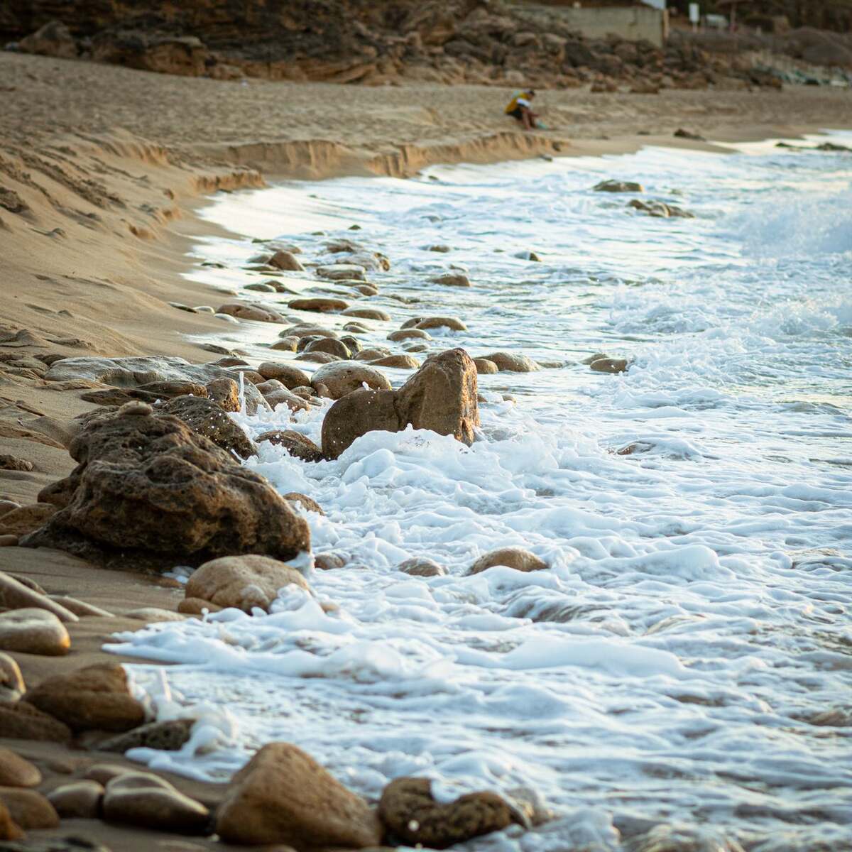 Rocky shoreline with waves at Tabarka, Tunisia